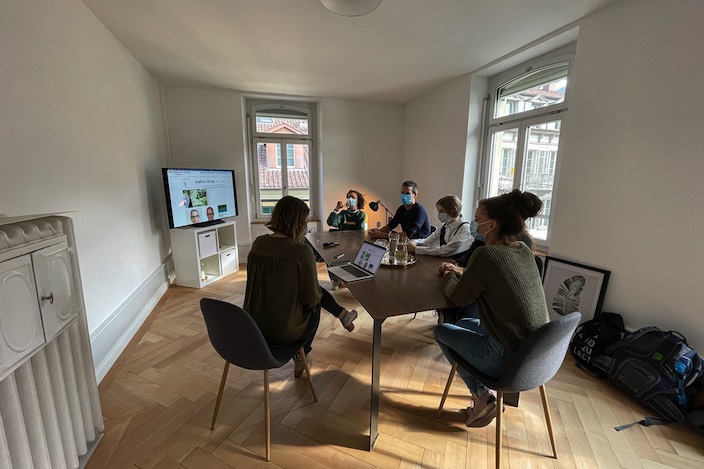 Project group with editor Jocelyne Page in meeting rooms at Jungfrau Zeitung.