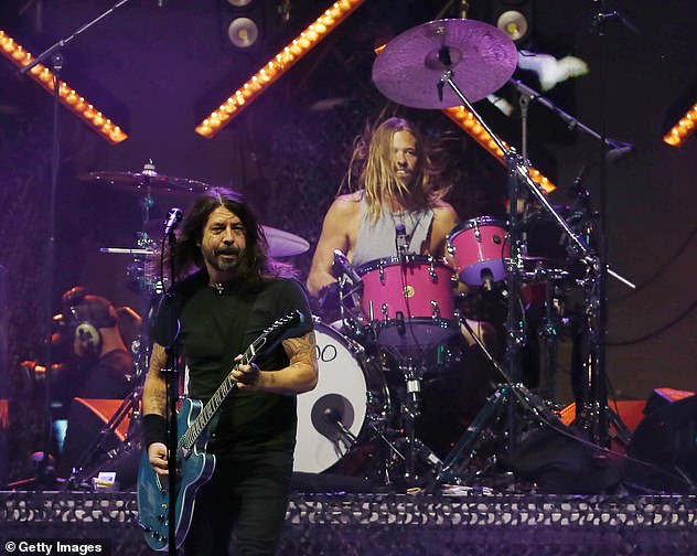The latest: The Foo Fighters will not perform at the 2022 Grammy Awards on Sunday in the wake of the death of drummer Taylor Hawkins at age 50 last week.  Singer Dave Grohl, 53, and Hawkins are seen performing on March 20 in Santiago, Chile.