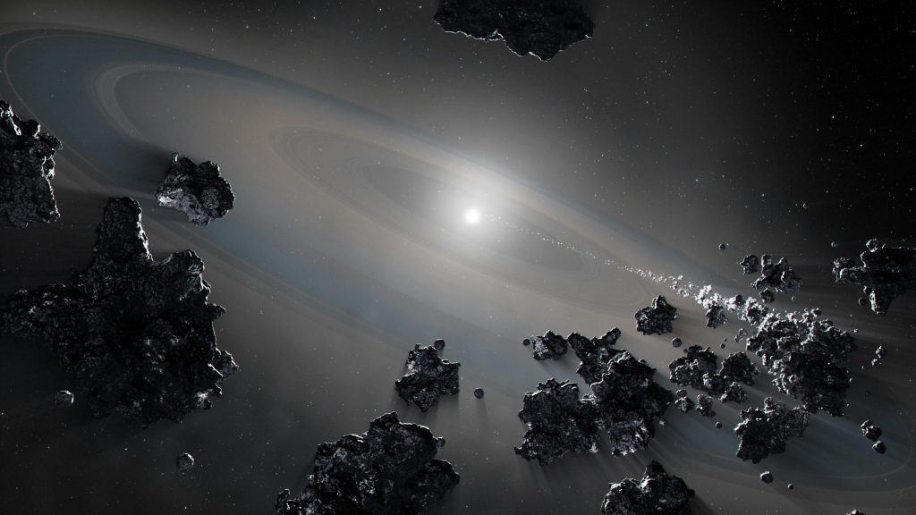 A dead star caught violently ripping apart the planetary system