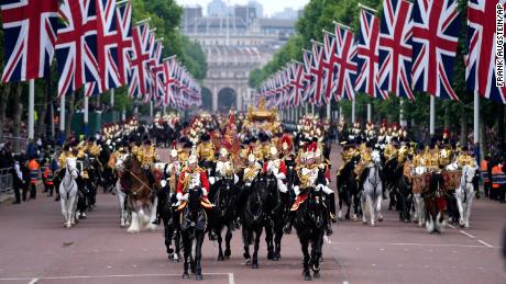 Soldiers parade during the Platinum Jubilee competition outside Buckingham Palace in London on Sunday.