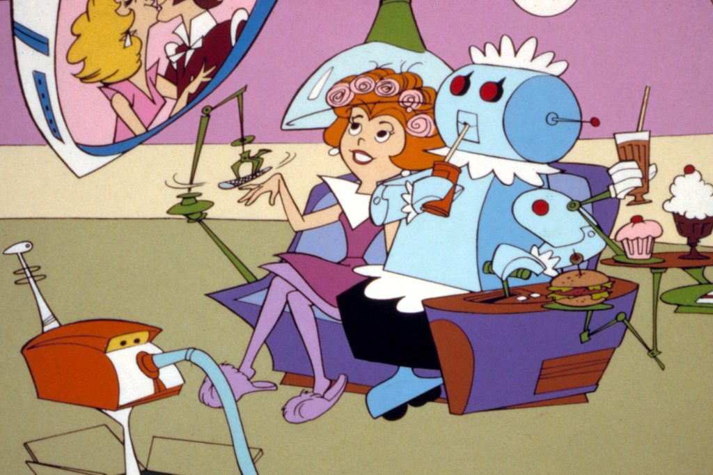 Judy Jetson cleans her nails with a machine.