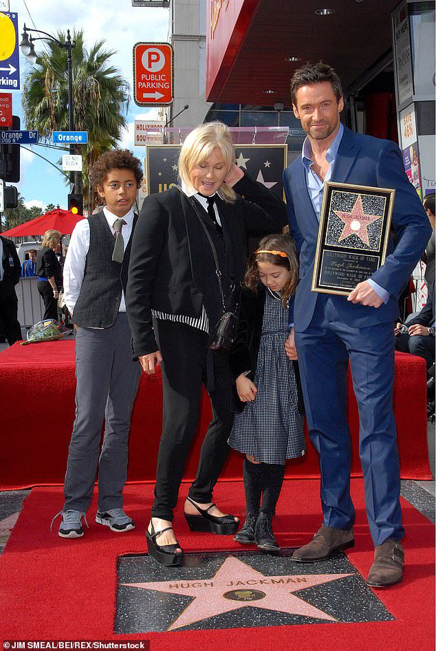 Happy family: Jackman and his wife Deborah Lee Furness have two children together: 22-year-old Oscar and 17-year-old Ava (from left to right: Oscar, Deborah Lee, Ava, Hugh pictured in 2012)