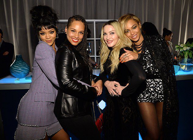 Friends in high positions!  Madonna pictured with Beyoncé, Rihanna and Alicia Keys in 2015