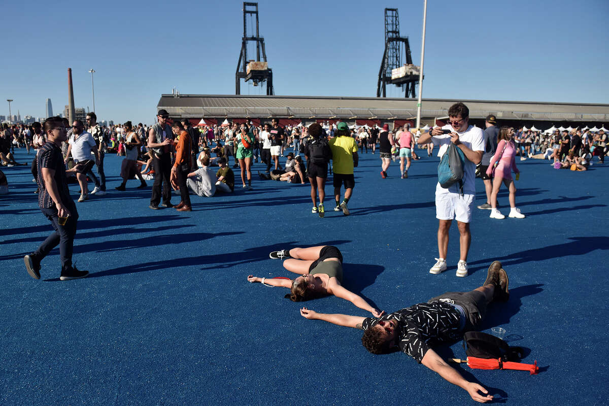 Concert-goers hang out near the Pierre Steig at the Portola Music Festival, Saturday, September 25, 2022.
