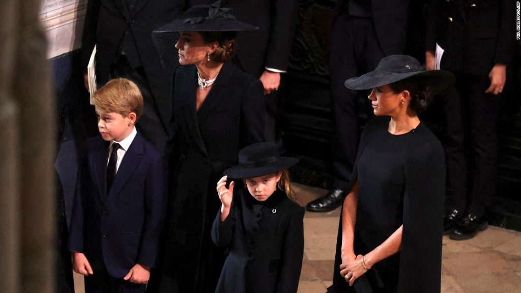 Prince George and Princess Charlotte walk the Queen's funeral procession