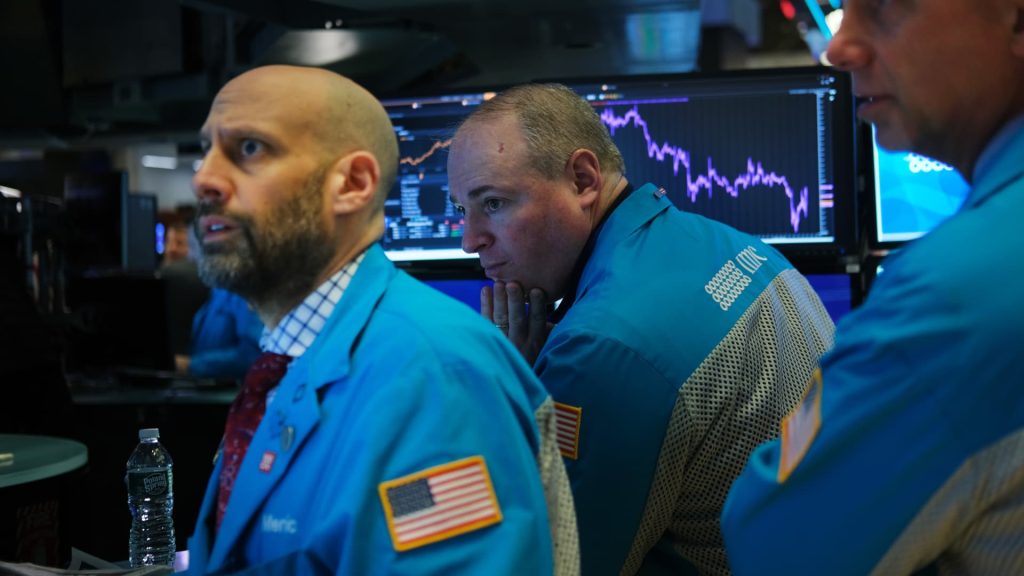 Dow drops more than 300 points as violent trading week tumbles