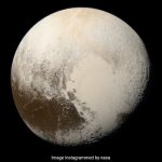 NASA shares a stunning photo of Pluto that shows its true colours