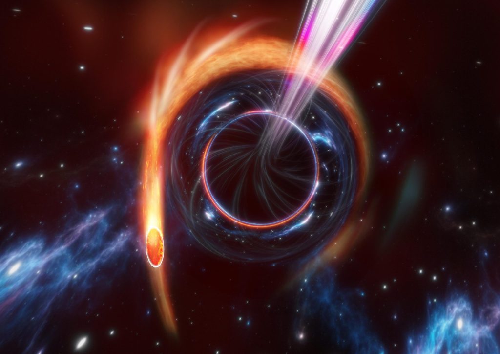 The supermassive black hole violently shreds stars and shoots a relativistic jet toward Earth