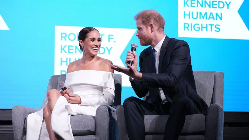 Harry and Meghan accept the award in New York ahead of the release of the Netflix series
