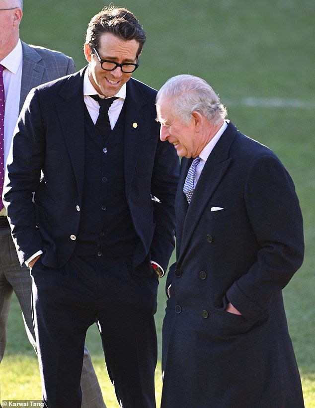 King Charles seemed to share a joke with Hollywood A-Leicester Ryan Reynolds - who bought the Welsh football club in February 2021